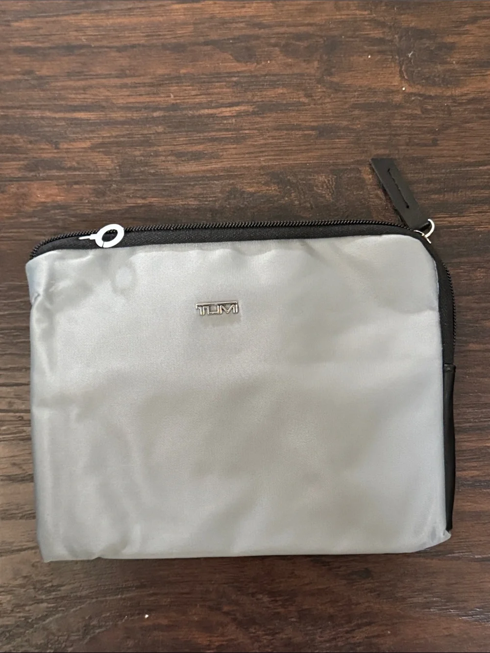 Tumi Silver and Black Toiletry Pouch – Compact Travel Organizer